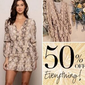 Olivaceous Beige and Black Long Sleeve Dress. NWOT Size Medium